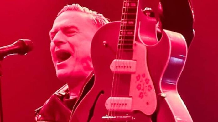 Brian Adams found his first real six-string guitar after summer of 69

