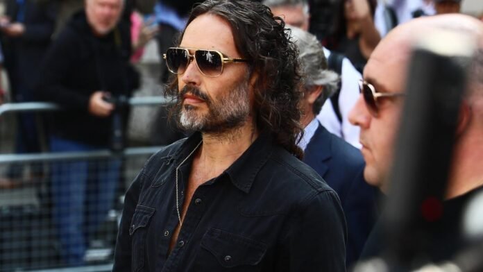 Russell Brand granted conditional bail after appearing in London court on allegations of rape and attack


